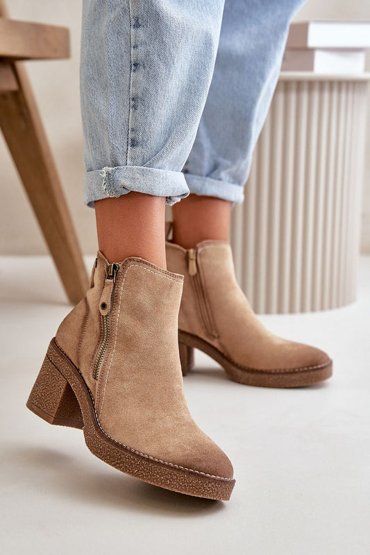 Heel boots Step in style